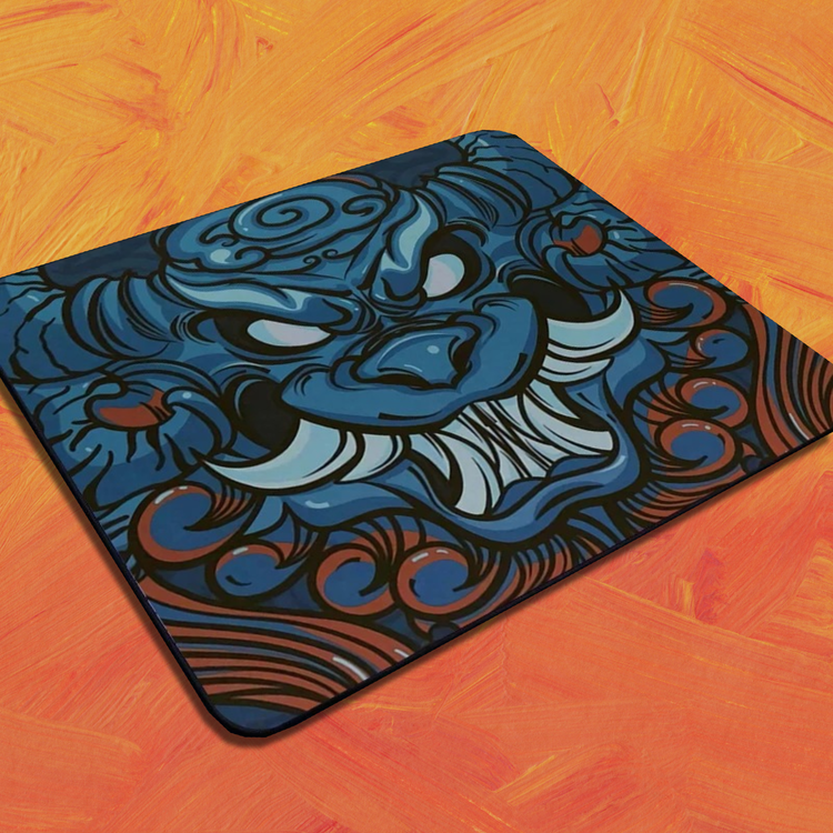frontal view of a mouse pad with a blue dragon with orange accents and an orange background
